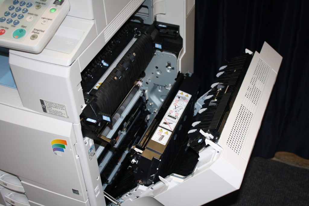 A printer that has been damaged by the ink.