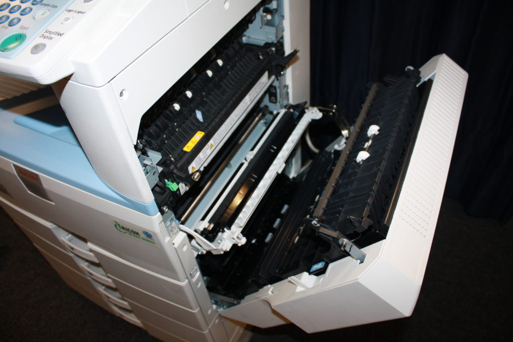 A printer that has been broken open.
