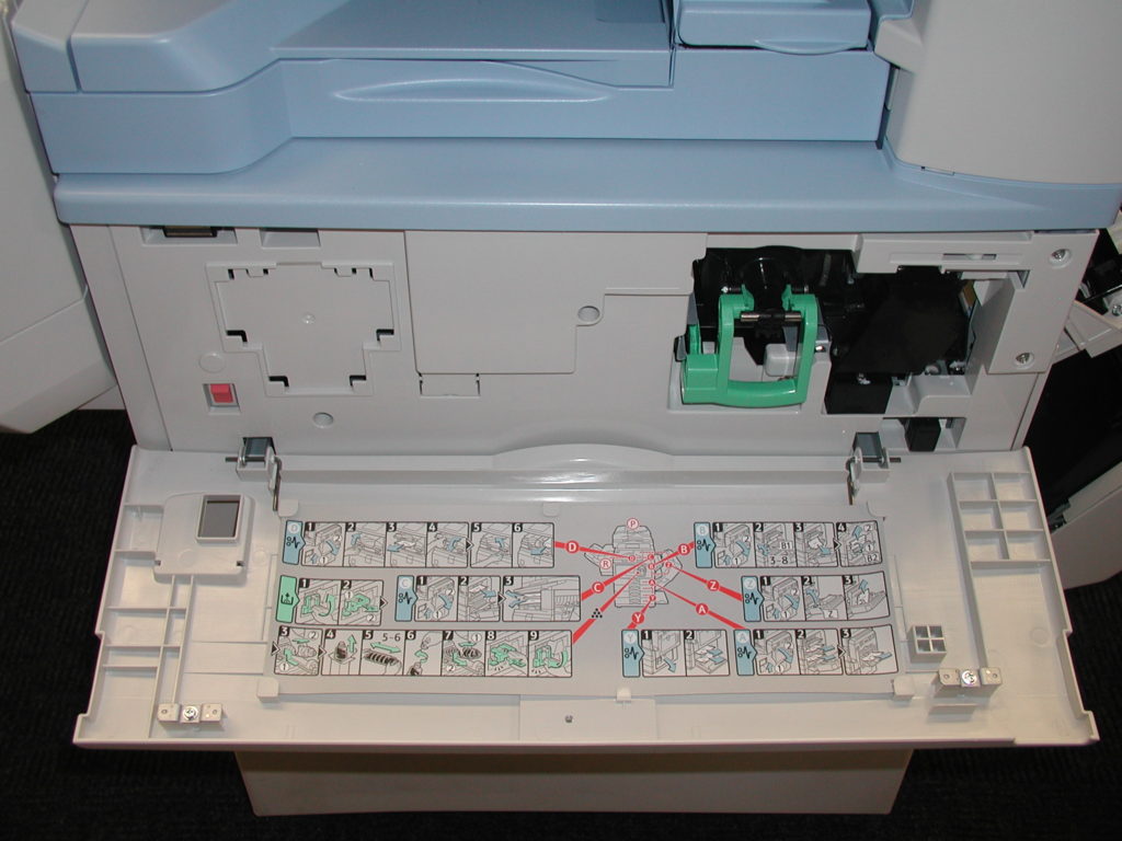 A close up of the keyboard and paper tray